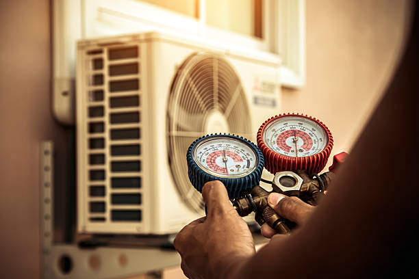 Professional Air Conditioning Service technician working in Harrington Park, NJ